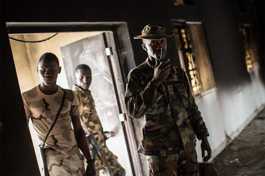 One of Nigeria's senior army officers, who was kidnapped by unknown abductors on March 26, 2016, was found dead three days later in northern Kaduna state. In this picture, Nigerian troops inspect the former emir's palace that was used by Boko Haram as their headquarters before it was burned down in Bama, Borno state, on March 25, 2015. PHOTO: NICHOLE SOBECKI/AFP/GETTY IMAGES