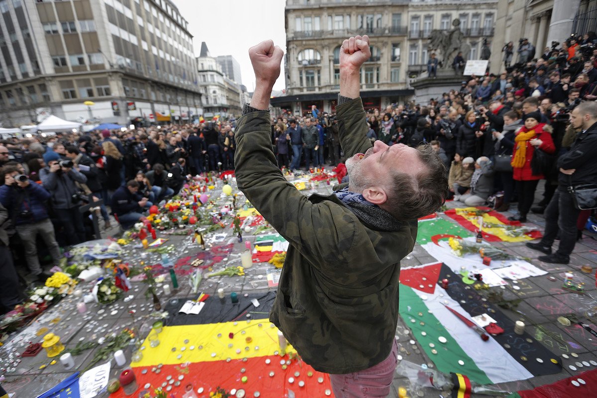 A man at a street memorial after Tuesday's attacks in Brussels.
