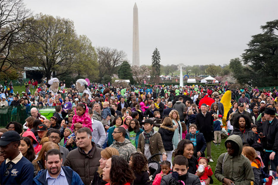 Families wait for the president’s arrival.