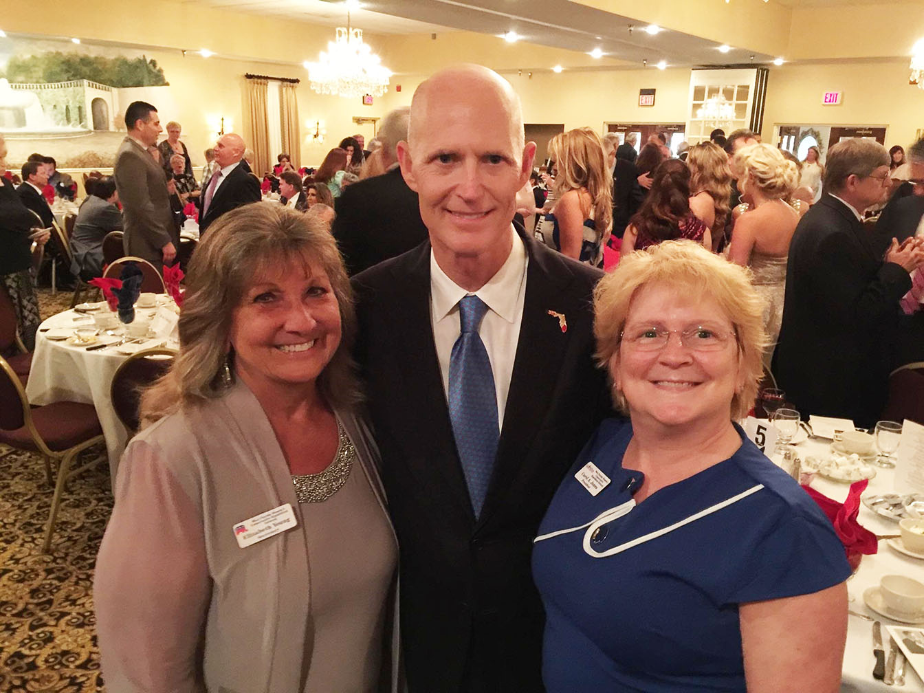 Reagan-Day Dinner photo form, left:, Dr. Elizabeth “Liz” Young, Secretary of Florida Conservative Republican Network, Florida State Governor Rick Scott, and Carol Jones, President, of Florida Conservative Republican Network.