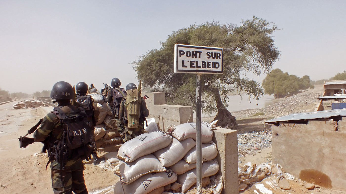 Cameroonian soldiers stand guard at a lookout post on Feb. 25 as they take part in operations against the Islamist extremist group Boko Haram in northern Cameroon, near the border with Nigeria.