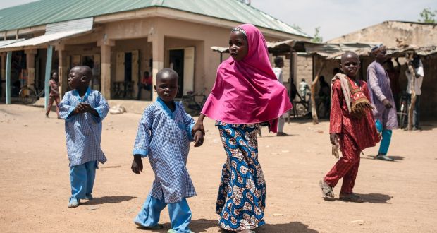 Children walk down the street of Chibok in Borno State, northeast Nigeria. In April 2014, Boko Haram militants kidnapped 276 schoolgirls from their dormitories at the government run girls’ secondary school in Chibok, drawing global attention to the Islamist insurgency in northeast Nigeria. Photograph: Stefan Heunisstefan/Getty Images 