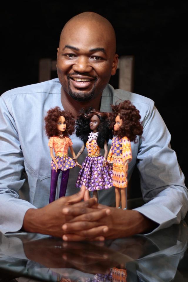 Taofick Okoya poses with his Queens of Africa dolls. (Photo: Isaac Emokpae)