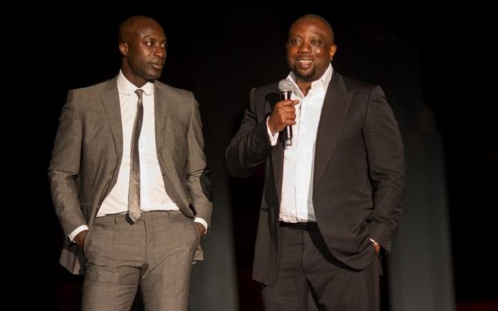 Tailored for success.: Ozwald Boateng, left, and Kola Aluko at a banking award ceremony in Morocco in 2013 Credit: Didier Baverel