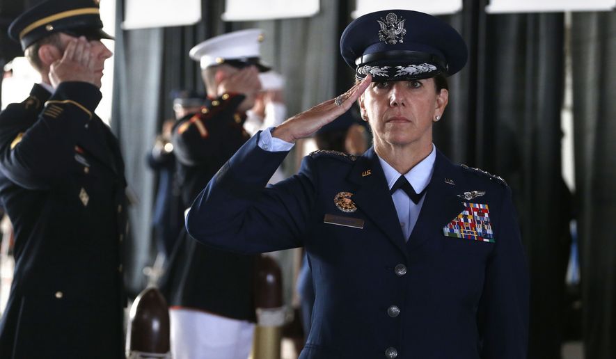 Air Force Gen. Lori J. Robinson, the incoming commander of the North American Aerospace Defense Command and U.S. Northern Command, salutes during her arrival at the change of command ceremony, at Peterson Air Force Base, in Colorado Springs, Colo., Friday, May 13, 2016. Gen. Robinson is the first woman to lead a top-tier U.S. military command after taking charge Friday at NORAD and USNORTHCOM. (AP Photo/Brennan Linsley)