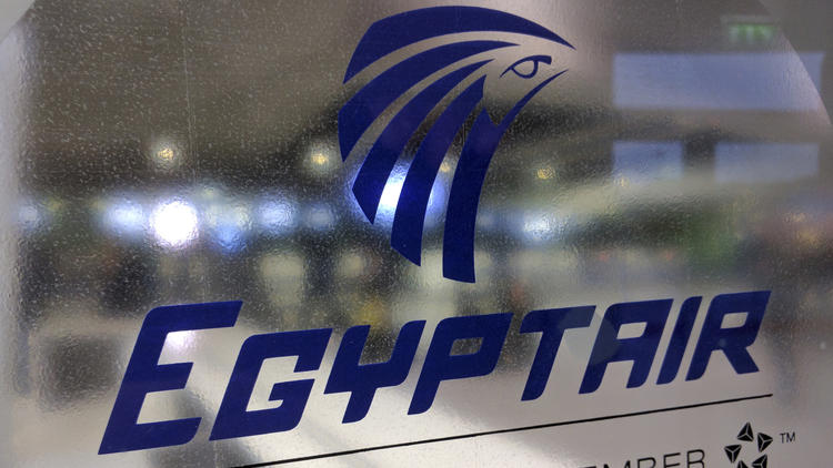 A frosted glass partition is seen at the EgyptAir counter at Charles de Gaulle Airport outside Paris, France, Thursday, May 19, 2016. EgyptAir said a flight from Paris to Cairo disappeared from radar early Thursday morning.  (Raphael Satter / AP)