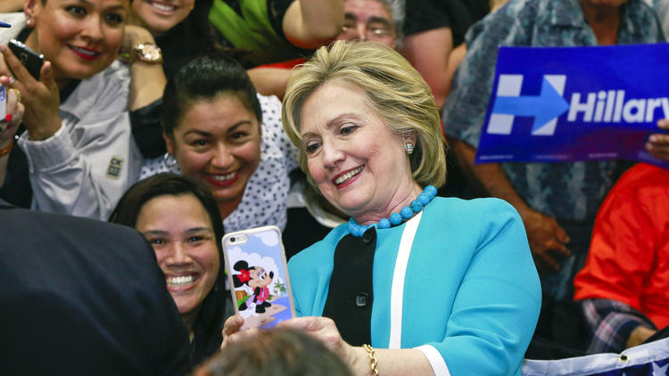 Democratic presidential candidate Hillary Clinton takes a photo with supporters at the end of a campaign stop at East Los Angeles College in Los Angeles, Thursday, May 5, 2016.  (Damian Dovarganes, AP)