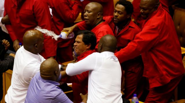About 20 EFF members, who were wrestled from their seats by plain-clothed guards on Tuesday, refused to let Zuma speak and shouted down Baleka Mbete, the speaker of the National Assembly. The EFF argued that Zuma was not fit to address the house after recent court decisions against the president before adding that they would repeat their disruptive actions until he resigned.