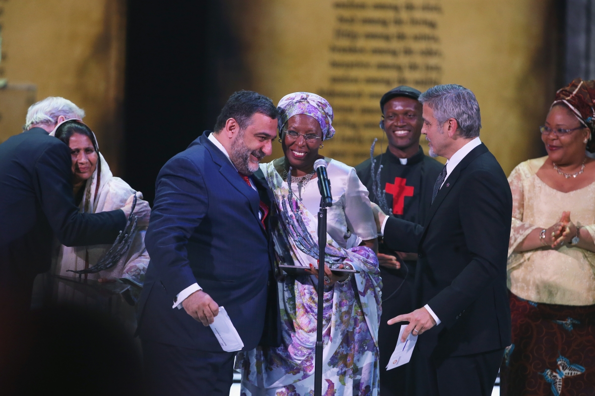 Marguerite Barankitse received a $1.1m (£760,000, €1m) cheque from the Hollywood star George Clooney, who is co-chair of the prize, during a ceremony in Yerevan in conjunction with commemorations for the Armenian genocide