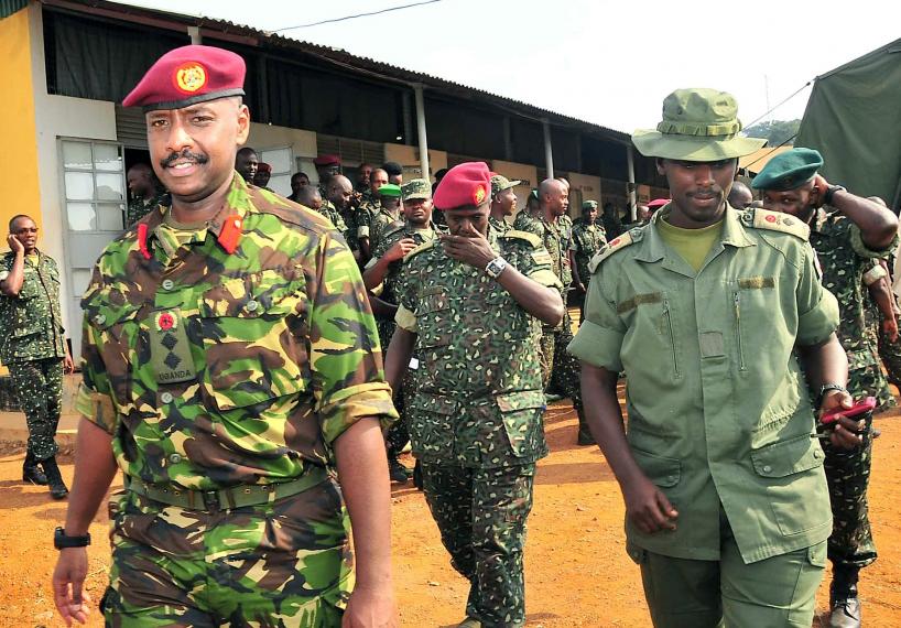 The son of Ugandan President Yoweri Museveni, Muhoozi Kainerugaba (L), is pictured at a military training center in Kampala, Uganda, August 16, 2012. Muhoozi has been promoted to the rank of Major-General in Uganda's armed forces.