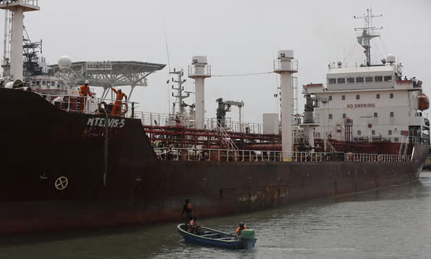 A rescued Panama-flagged Maximus vessel at the Naval dock yard. It was supposed to be a U.S.-led naval training maneuver off the coast of West Africa when real-life drama intervened, with pirates taking over an oil tanker and turning the exercise into a rescue mission. Navies from the United States, Ghana, Togo and Nigeria tracked the hijacked tanker through waters off five countries before Nigerian naval forces stormed aboard Saturday Feb. 20, 2016, amid a shootout that killed one of the pirates. (Photo: Sunday Alamba, AP)