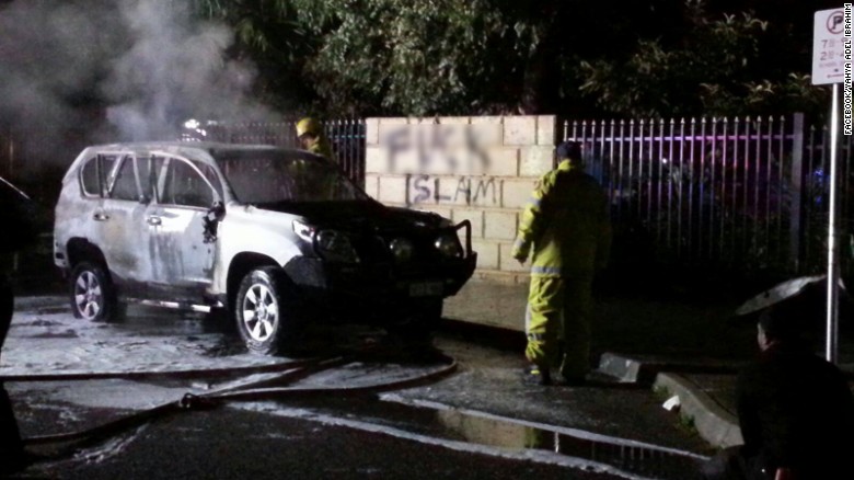 The scene outside a mosque in Perth, Australia, where cars were set alight in an anti-Muslim attack.