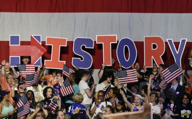 Supporters for Democratic presidential candidate Hillary Clinton spell the word “history” during a presidential primary election night rally, June 7, 2016, in New York. (photo: Julie Jacobson/ap)