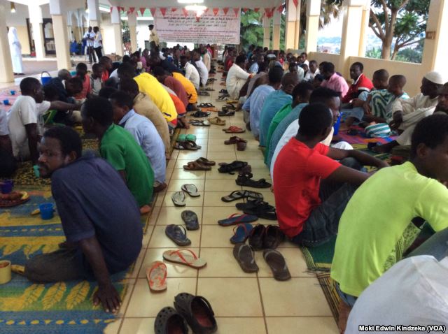 Christians breaking the fast wtih Muslims at a mosque in Yaounde.