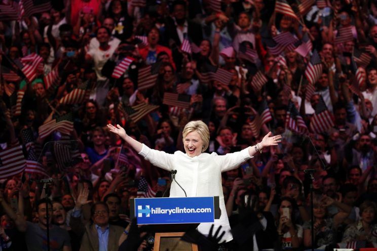 Hillary Clinton acknowledges celebratory cheers during a primary night event at the Brooklyn Navy Yard, June 7, 2016.