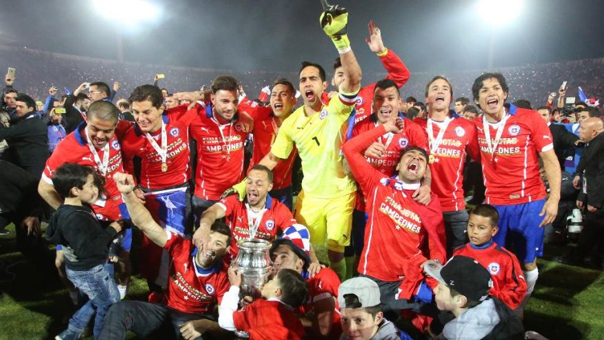 Celebrating their victory.... Cup holders, Chile have stunned Argentina to win the Copa America Centenario in a penalty shoot-out as Lionel Messi's title curse struck again.