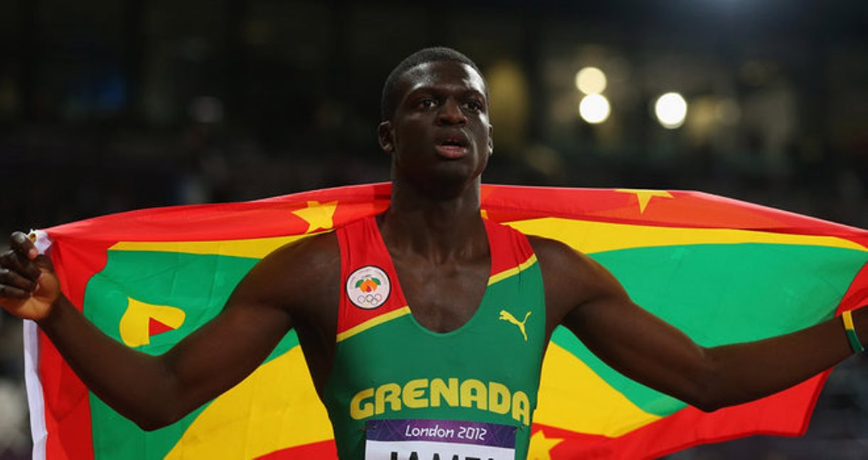 Kirani James celebrates winning 400m gold at the 2014 Commonwealth Games.