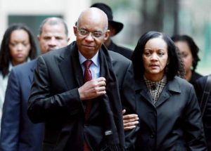 November 2009 - Former Congressman William Jefferson (D-LA) walks with his wife Andrea Jefferson as he arrives at US District Court for his sentencing hearing in Alexandria, Virginia. (Wilson/Getty).