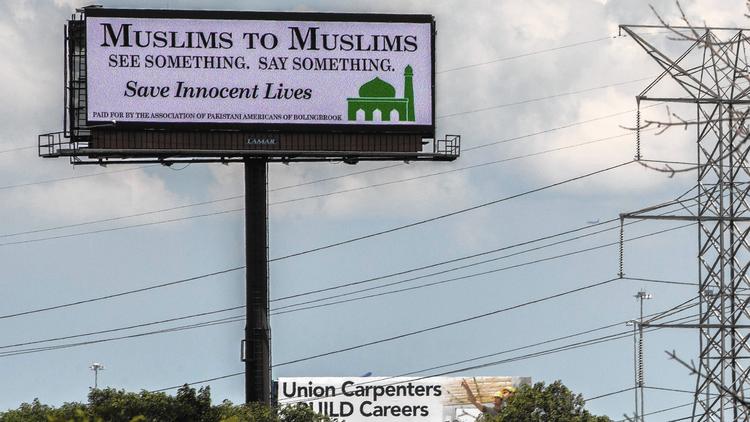 A billboard on Interstate 55 by the Association of Pakistani Americans of Bolingbrook urges Muslims to speak up if they see other Muslims engaging in suspicious activity. (Zbigniew Bzdak / Chicago Tribune)