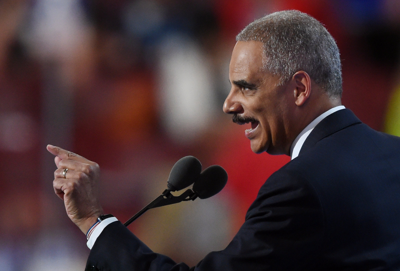 "This election is about much more than politics," former U.S. Attorney General Eric Holder said.  Timothy A. Clary/AFP/Getty Images  hide caption toggle caption  Timothy A. Clary/AFP/Getty Images 