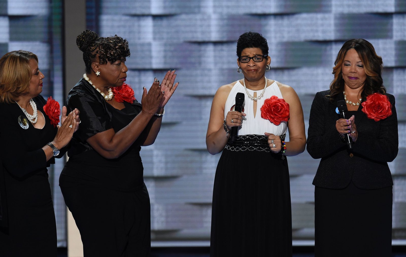 Geneva Reed-Veal (second from right) speaks about her support for Hillary Clinton and about her daughter, Sandra Bland, who was found dead in her jail cell last summer.  Saul Loeb/AFP/Getty Images  hide caption toggle caption  Saul Loeb/AFP/Getty Images 