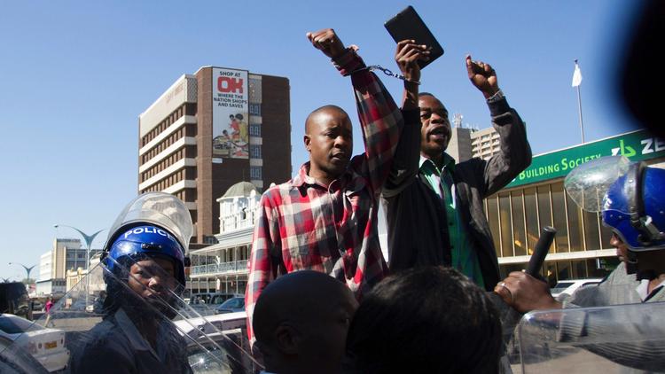 Zimbabwean police arrest protesters on July 6 2016, in Bulawayo. (AFP/Getty Images)