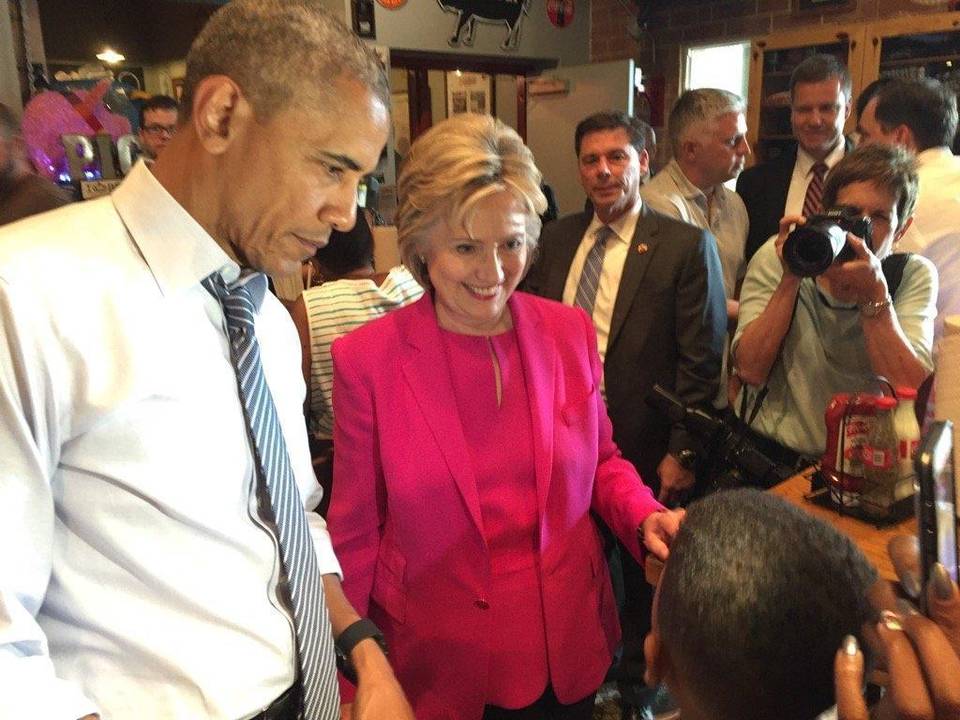 President Barack Obama and Hillary Clinton talk to patrons at Midwood Smokehouse during an unannounced visit following their joint appearance.  Jim Morrill  - jmorrill@charlotteobserver.com.  