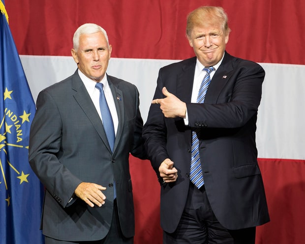 Trump (Right)..., Pence, a Catholic, earned a law degree from Indiana University in 1986 and ran two unsuccessful congressional campaigns before getting elected in 2000.