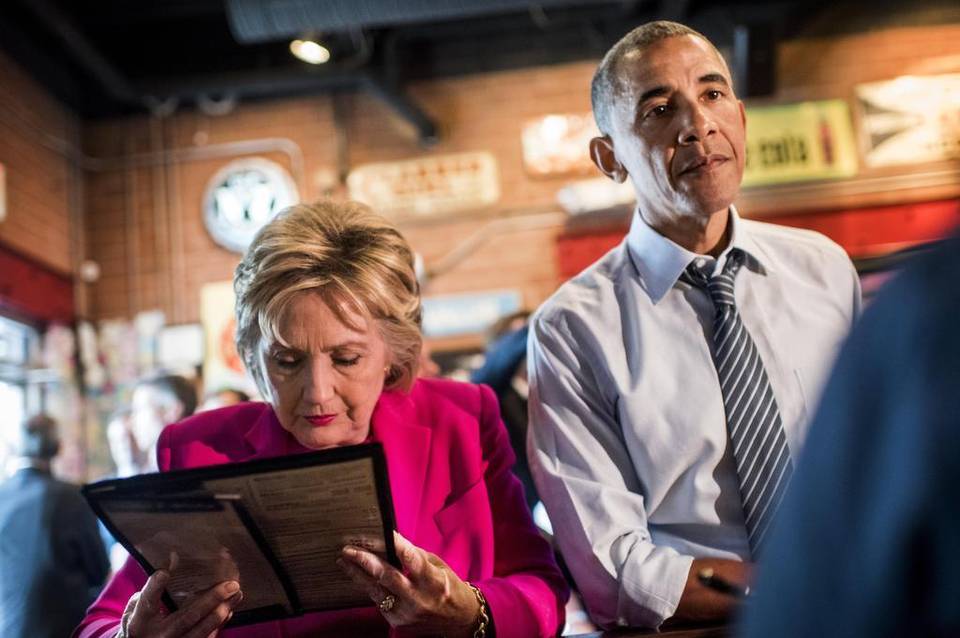 Democratic presumptive nominee Hillary Clinton and President Barack Obama prepare to order some barbecue at Midwood Smokehouse after a rally in Charlotte, North Carolina on Tuesday. Melina Mara - The Washington Post.