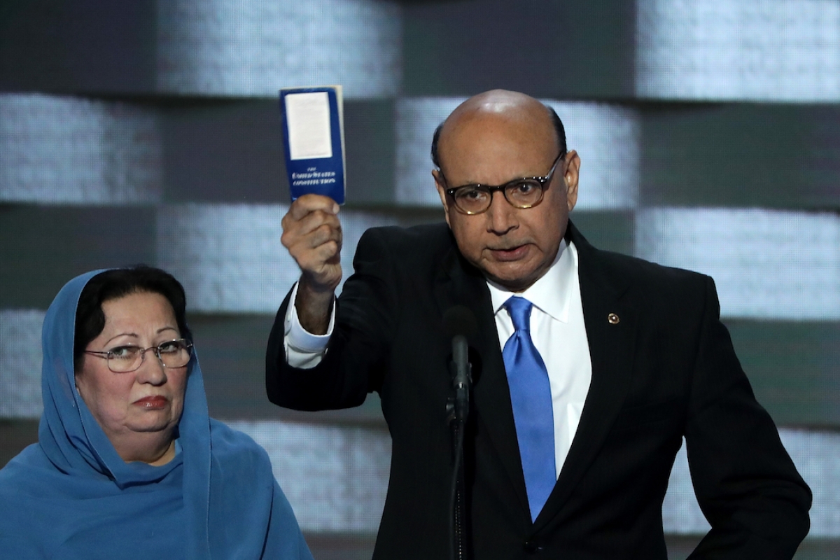 July 28, Khizr Khan, father of fallen US Army Capt. Humayun S. M. Khan and his wife Ghazala speak during the final day of the Democratic National Convention in Philadelphia. Republican presidential nominee Donald Trump broke a major American political and societal taboo over the weekend when he engaged in an emotionally-charged feud with Khizr and Ghazala Khan, the bereaved parents of a decorated Muslim Army captain killed by a suicide bomber in Iraq. He further stoked outrage by implying Ghazala Khan did not speak while standing alongside her husband at last week's Democratic convention because they are Muslim.