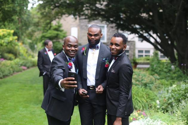 Groomsmen pose for a selfie before we head back to the reception. 