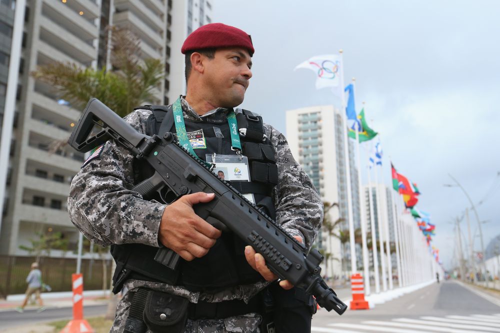 Alexander Hassenstein/Getty Images Brazilian police are underfunded and now have to provide security for a huge international event.
