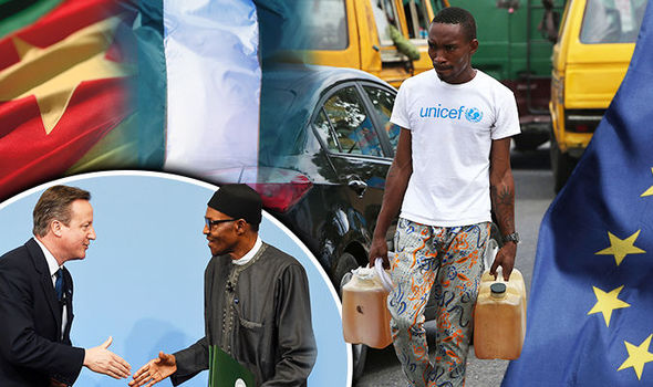 A man wearing a Unicef charity t-shirt sells black market fuel to motorists