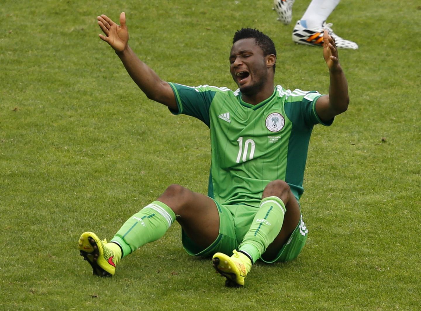  Nigeria's John Obi Mikel calls for a foul during a match at the World Cup in Porto Alegre, Brazil, June 25, 2014. Mikel is the captain of Nigeria's Olympic football team, which is due to arrive in Brazil just hours before their first game on Thursday.  Marko Djurica/Reuters 