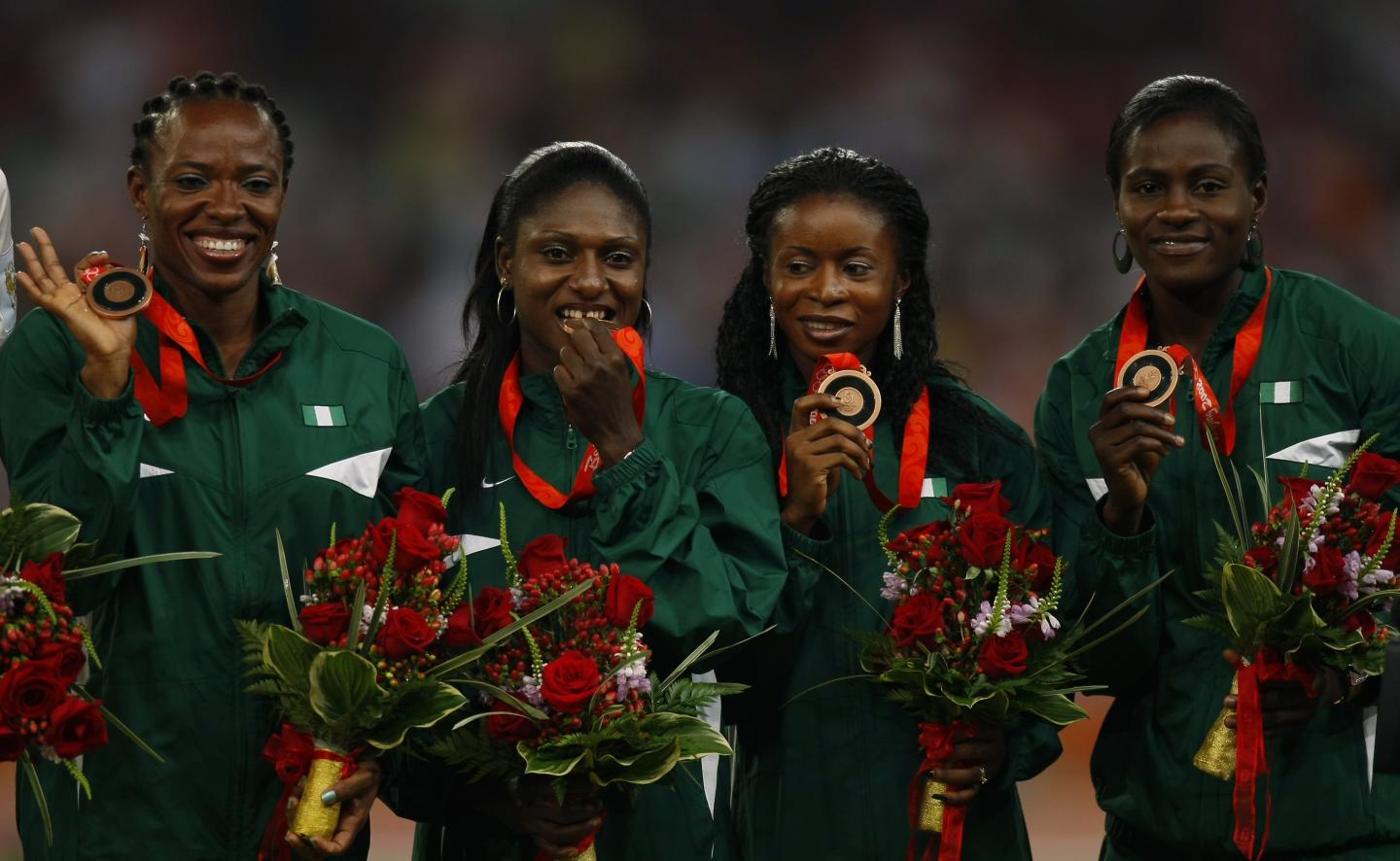  Nigeria's women's 4x100-meter relay team pose with their bronze medals at the Beijing 2008 Olympic Games, August 23, 2008. Olympic medals have been few and far between for Nigeria.  Mike Blake/Reuters 