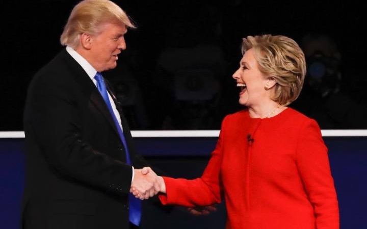 Donald Trump and Hillary Clinton shake hands at the first presidential debate Credit: AP