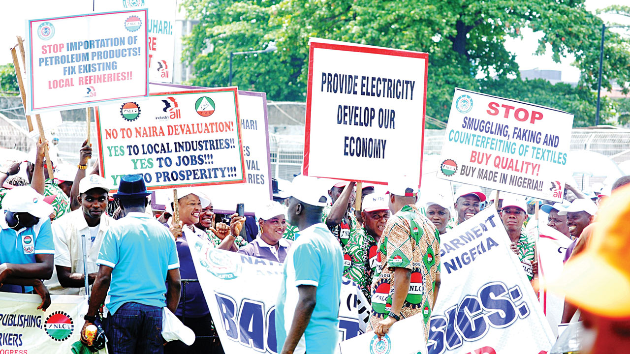 Workers displaying various placards, during a "May Day" rally at Onikan Studium in Lagos.