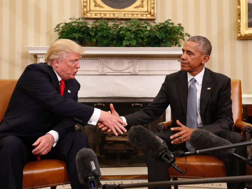 President Barack Obama shakes hands with President-elect Donald Trump in the Oval Office. Trump now stands to inherit an economy that’s gathering steam and could make his first year or two in office a new standard for prosperity.