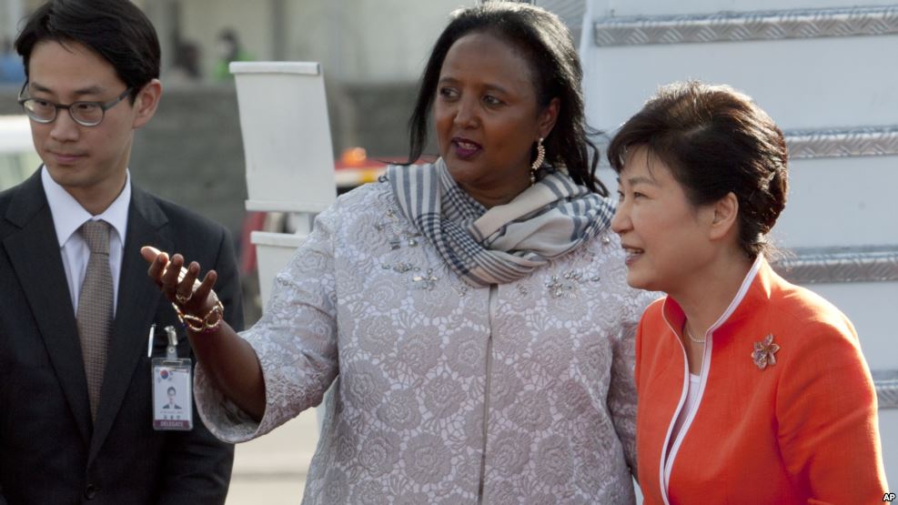 FILE - Kenyan Foreign Affairs Cabinet Secretary Amina Mohamed, center, welcomes South Korea's president Park Geun-hye at the Kenyatta International Airport, Nairobi, Kenya, May 30, 2016.