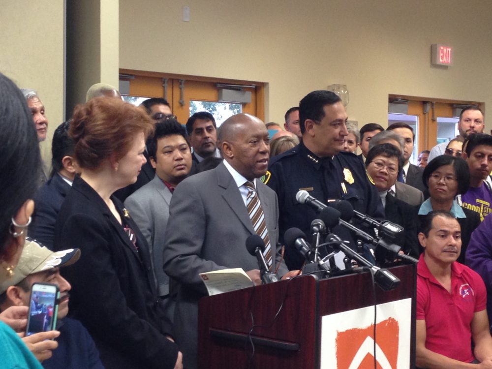 Mayor Sylvester Turner (center) held a press conference at the Baker-Ripley Center, located in southwest Houston, to announce the creation of the Office of New Americans, which will Houston residents, especially immigrants and refugees, to access City services with more ease.